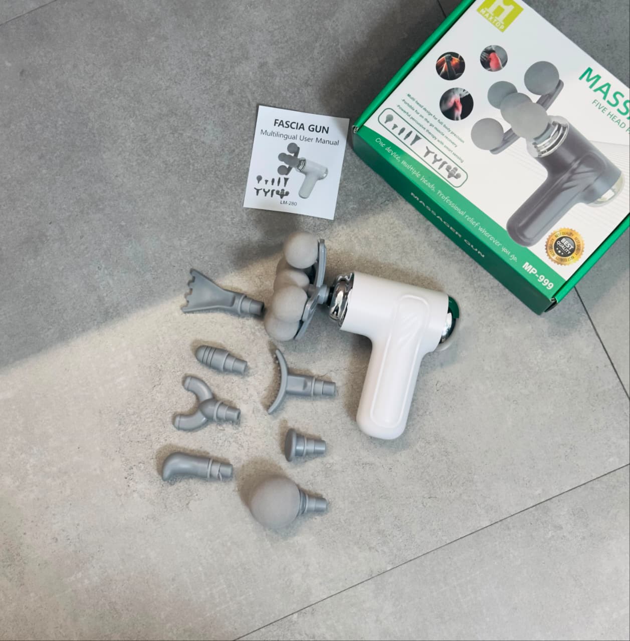 Portable Massage Gun with 8 Interchangeable Heads